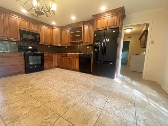 1653 Brierbrook Rd, Germantown, TN 38138 - kitchen featuring black appliances, washer / clothes dryer, a chandelier, open shelves, and tasteful backsplash