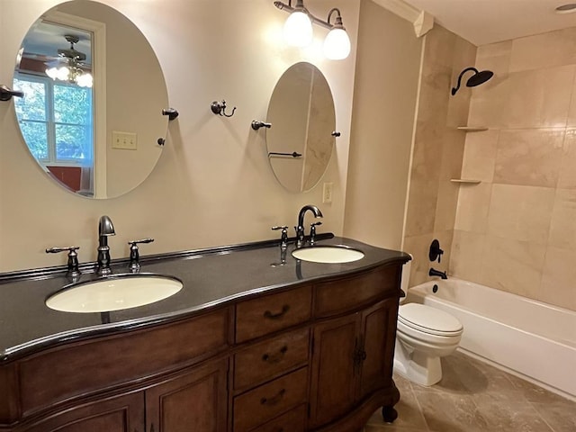 1653 Brierbrook Rd, Germantown, TN 38138 - full bathroom with ceiling fan, toilet, double vanity, washtub / shower combination, and tile patterned floors