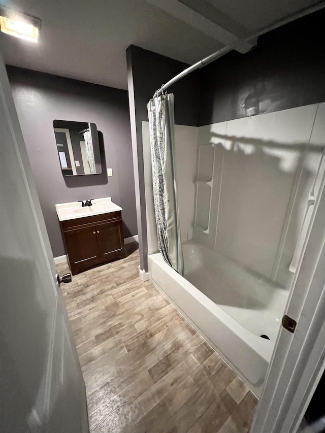 29 Wardlow St, Gates, TN 38037 - full bath featuring shower / bath combo, wood finished floors, and vanity