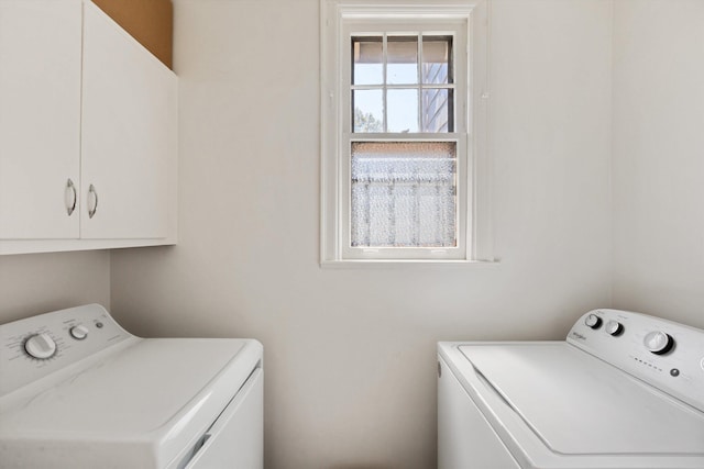 laundry area with cabinet space and washer and dryer