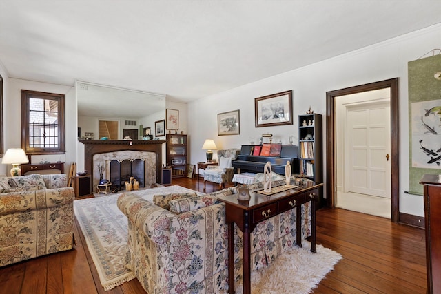 living room featuring a fireplace and hardwood / wood-style flooring