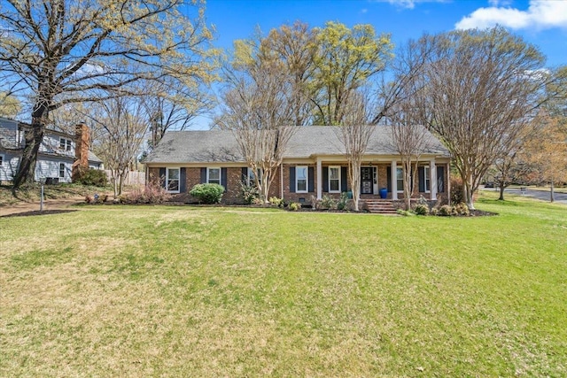 2060 Abergeldie Dr, Memphis, TN 38119 - ranch-style house with brick siding and a front lawn