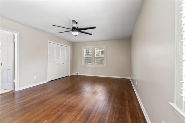 2060 Abergeldie Dr, Memphis, TN 38119 - unfurnished bedroom with visible vents, baseboards, ceiling fan, and wood finished floors