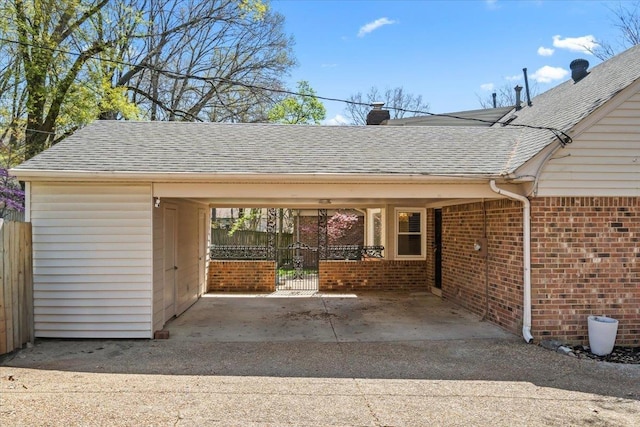 2060 Abergeldie Dr, Memphis, TN 38119 - exterior space featuring an attached carport, driveway, and fence