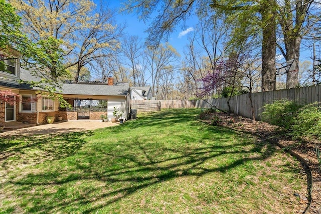 2060 Abergeldie Dr, Memphis, TN 38119 - view of yard with a fenced backyard and a patio area