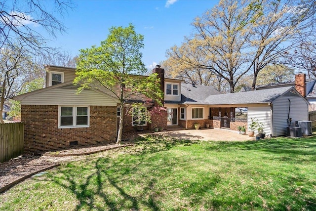 2060 Abergeldie Dr, Memphis, TN 38119 - rear view of property featuring brick siding, fence, a yard, and a patio area