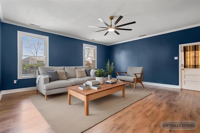 2060 Abergeldie Dr, Memphis, TN 38119 - living area featuring ceiling fan, visible vents, a healthy amount of sunlight, and crown molding