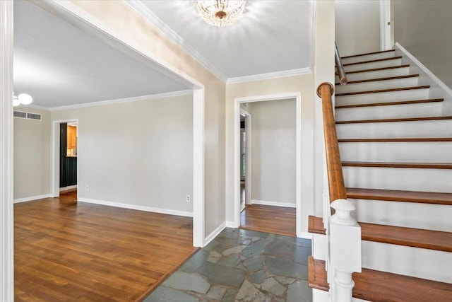 2060 Abergeldie Dr, Memphis, TN 38119 - entrance foyer with stairway, ornamental molding, baseboards, visible vents, and wood finished floors