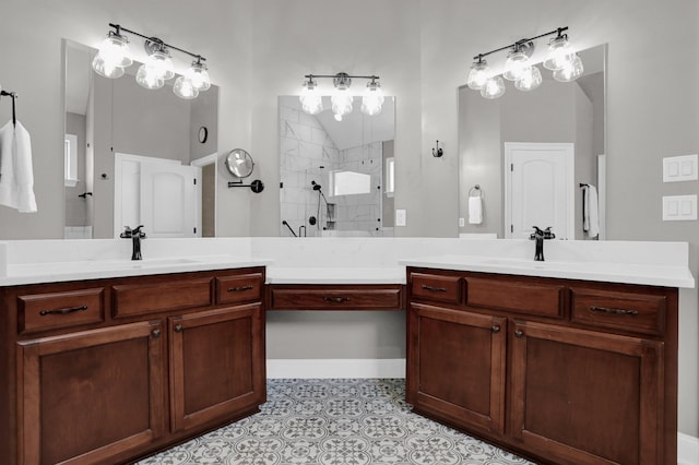 bathroom featuring tile patterned flooring, vanity, lofted ceiling, and a shower stall