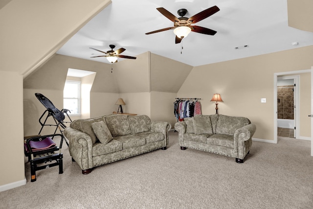 living room featuring carpet floors, a ceiling fan, lofted ceiling, baseboards, and visible vents