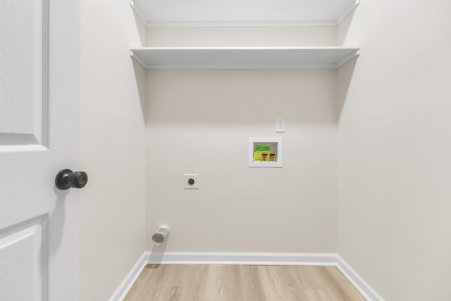 laundry room featuring electric dryer hookup, laundry area, baseboards, light wood-style floors, and hookup for a washing machine