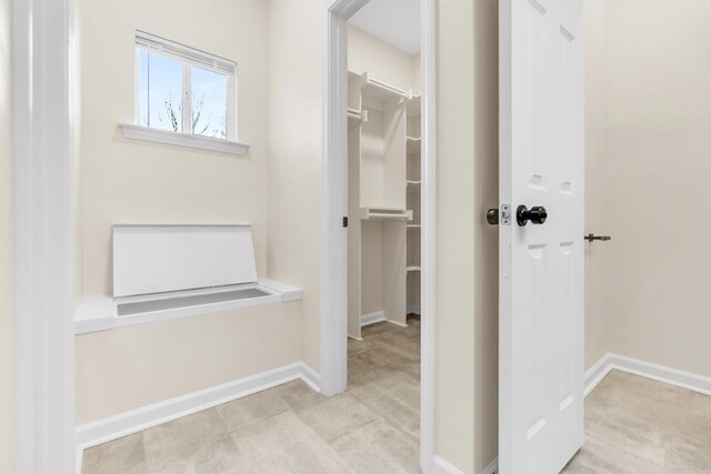 corridor with baseboards