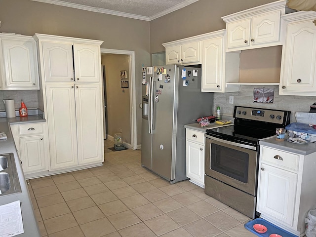 kitchen with light tile patterned flooring, tasteful backsplash, ornamental molding, and stainless steel appliances