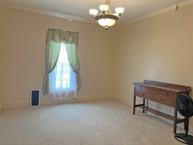 unfurnished room featuring baseboards, carpet floors, a chandelier, and crown molding