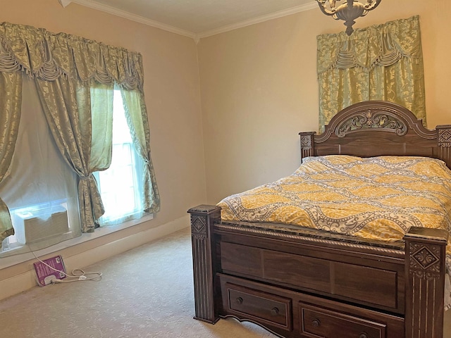 carpeted bedroom featuring ornamental molding and baseboards