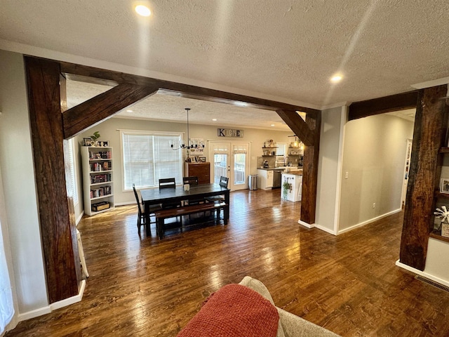 417 E Tigrett St, Halls, TN 38040 - dining space with recessed lighting, dark wood-type flooring, baseboards, and a textured ceiling