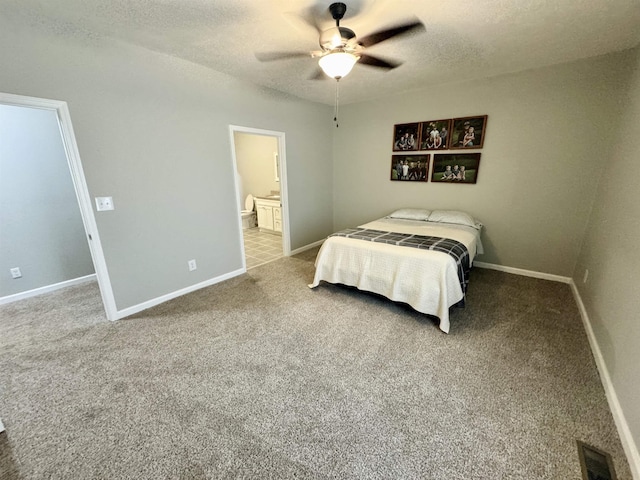 417 E Tigrett St, Halls, TN 38040 - bedroom featuring baseboards, visible vents, carpet floors, and a textured ceiling