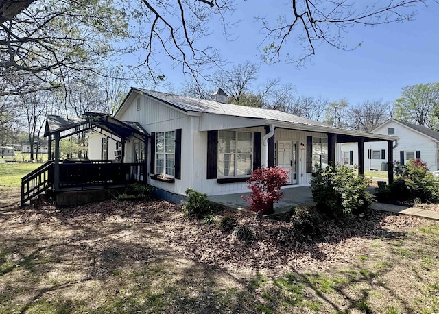 417 E Tigrett St, Halls, TN 38040 - view of front facade with metal roof