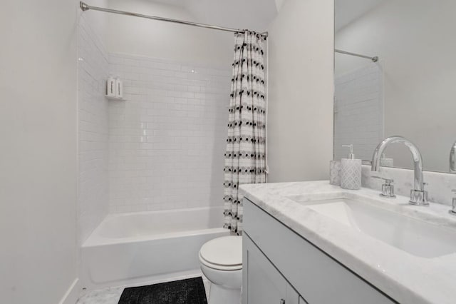 full bathroom with toilet, vanity, and washtub / shower combination