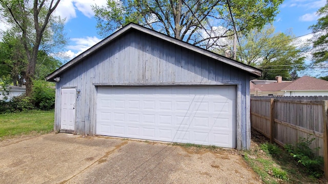 detached garage with fence