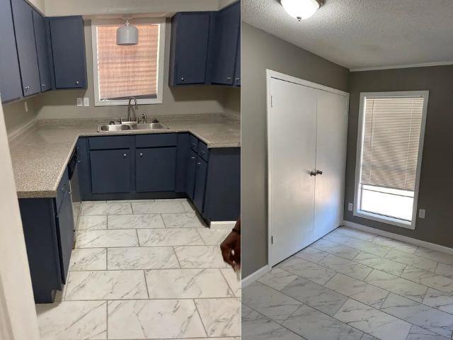 kitchen with a textured ceiling, marble finish floor, light countertops, and a sink