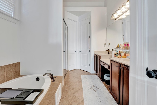 1985 Rochelle Ln, Memphis, TN 38016 - bathroom with vanity and a bath