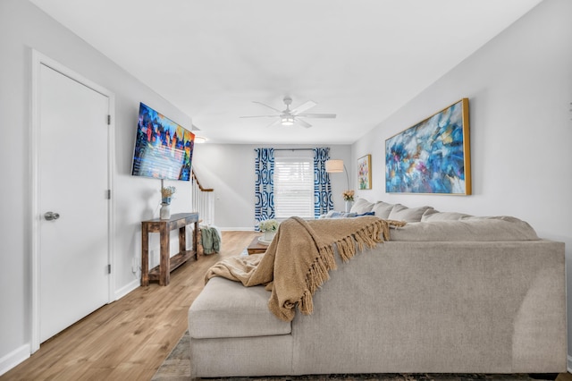 5878 Roxbury Dr Unit 5878, Memphis, TN 38119 - living area with baseboards, ceiling fan, and light wood-style floors