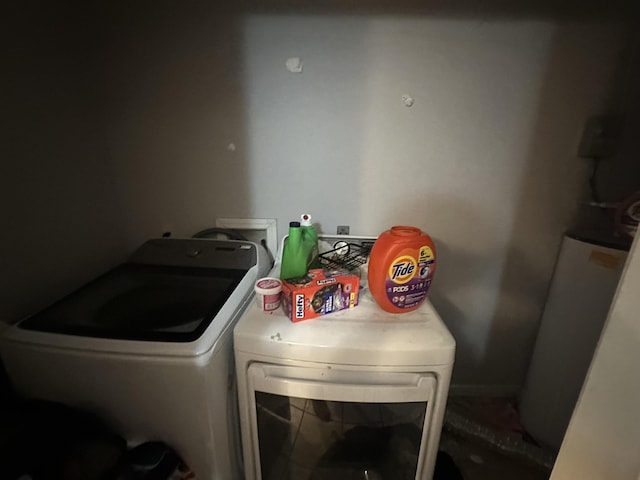 380 Summit Dr, Bolivar, TN 38008 - laundry room with washing machine and dryer and laundry area