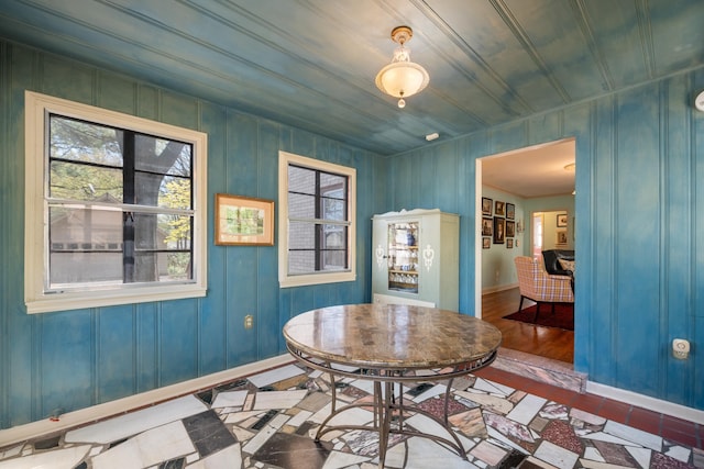 dining area featuring baseboards
