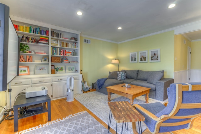 26 N Ashlawn Dr, Memphis, TN 38112 - living room with recessed lighting, ornamental molding, light wood-style floors, and visible vents