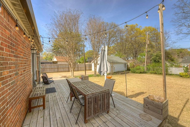 26 N Ashlawn Dr, Memphis, TN 38112 - deck featuring an outdoor structure and fence private yard