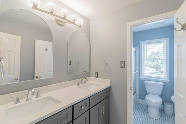 1249 Mintmere Dr, Collierville, TN 38017 - full bath featuring double vanity, tile patterned flooring, and combined bath / shower with glass door
