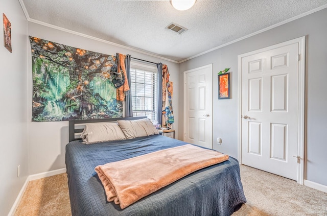 6376 Memphis-Arlington Rd, Bartlett, TN 38135 - carpeted bedroom featuring ornamental molding, a textured ceiling, and visible vents
