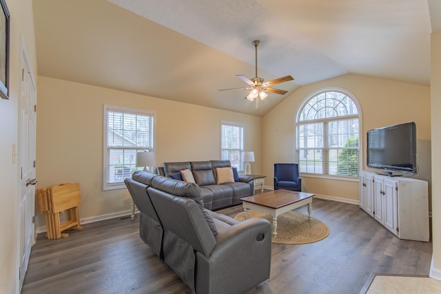 145 Ping Hill Cv, Counce, TN 38326 - living room with a ceiling fan, dark wood-style floors, and a healthy amount of sunlight