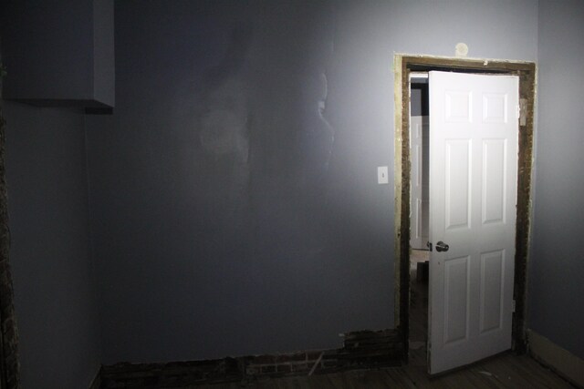 2387 Norman Ave, Memphis, TN 38108 - empty room with dark wood finished floors