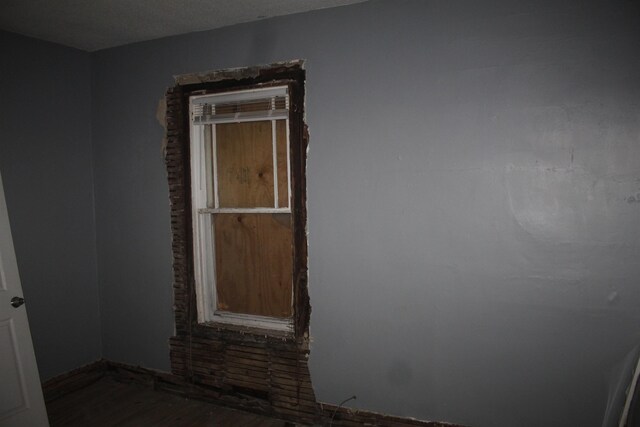 2387 Norman Ave, Memphis, TN 38108 - empty room featuring dark wood finished floors