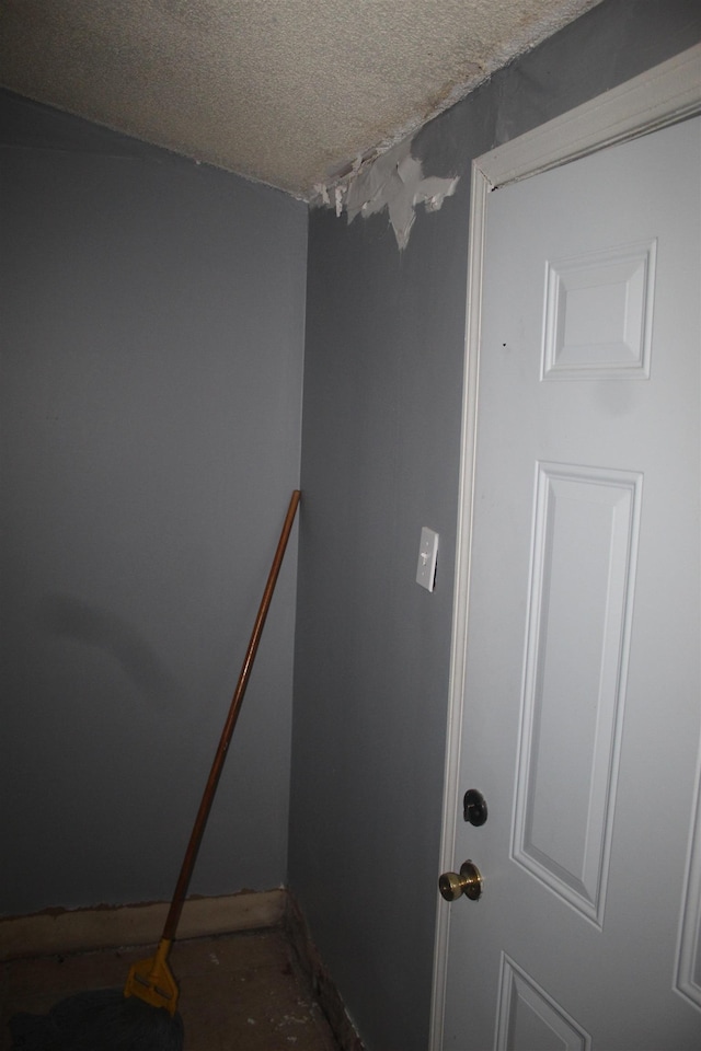 2387 Norman Ave, Memphis, TN 38108 - staircase featuring a textured ceiling