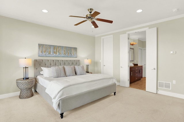 358 N Island Dr Unit 105, Memphis, TN 38103 - bedroom featuring light carpet, baseboards, visible vents, and crown molding