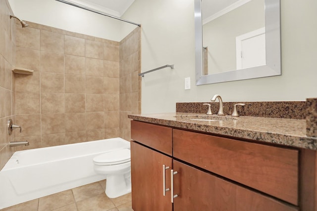358 N Island Dr Unit 105, Memphis, TN 38103 - bathroom featuring tile patterned floors, crown molding, toilet, vanity, and washtub / shower combination