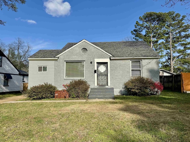 1280 Salem St, Memphis, TN 38122 - bungalow with a shingled roof, fence, a front lawn, and brick siding