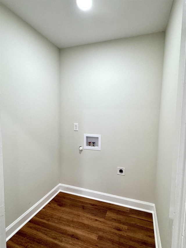 1280 Salem St, Memphis, TN 38122 - clothes washing area with baseboards, electric dryer hookup, washer hookup, dark wood-type flooring, and laundry area