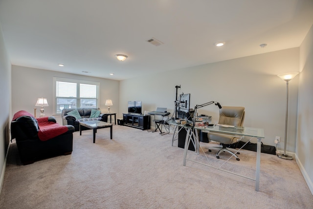 carpeted office space featuring baseboards, visible vents, and recessed lighting