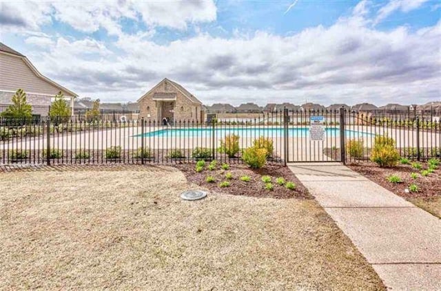 community pool with fence