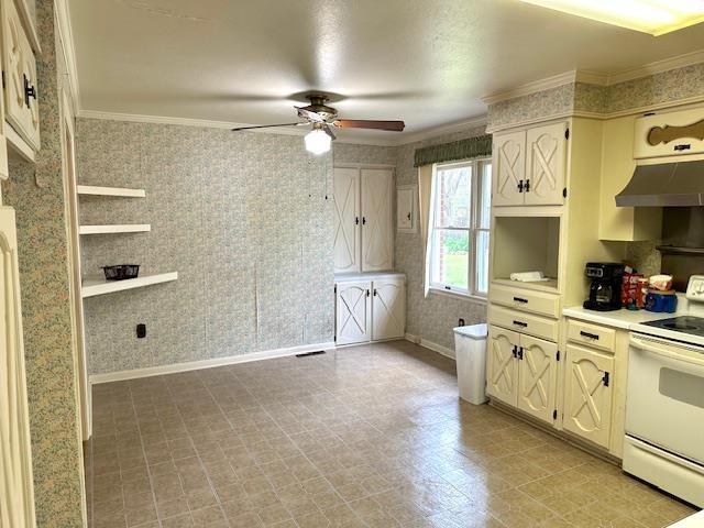 kitchen with wallpapered walls, white range with electric stovetop, and under cabinet range hood