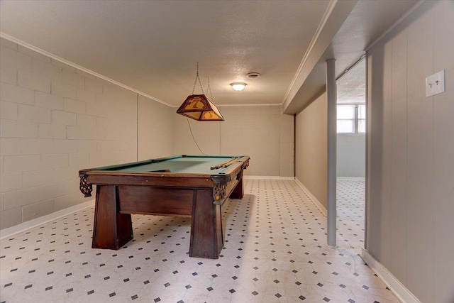 playroom with visible vents, crown molding, billiards, concrete block wall, and light floors