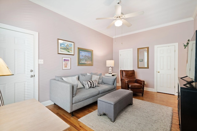1005 River Currents Dr, Memphis, TN 38103 - living room with light wood-style floors, baseboards, a ceiling fan, and ornamental molding