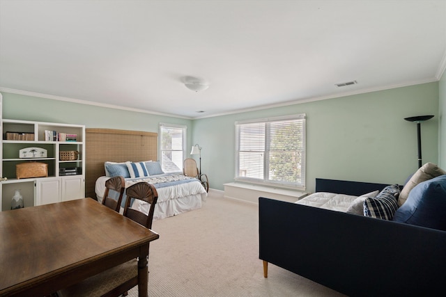 1005 River Currents Dr, Memphis, TN 38103 - carpeted bedroom with ornamental molding, visible vents, and baseboards