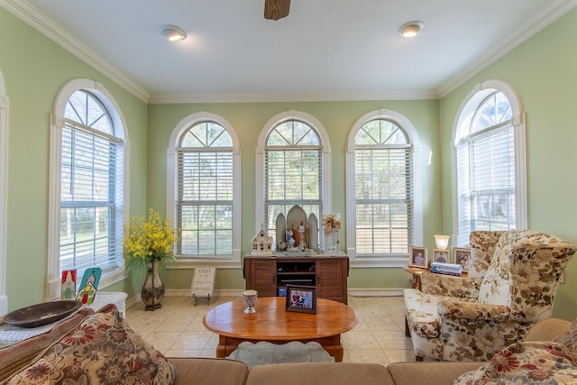 living area with a wealth of natural light and tile patterned flooring