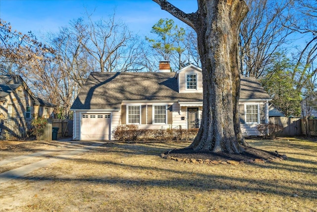 cape cod-style house with driveway, a chimney, fence, and an attached garage