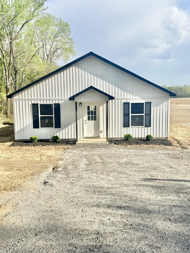 modern farmhouse style home with board and batten siding